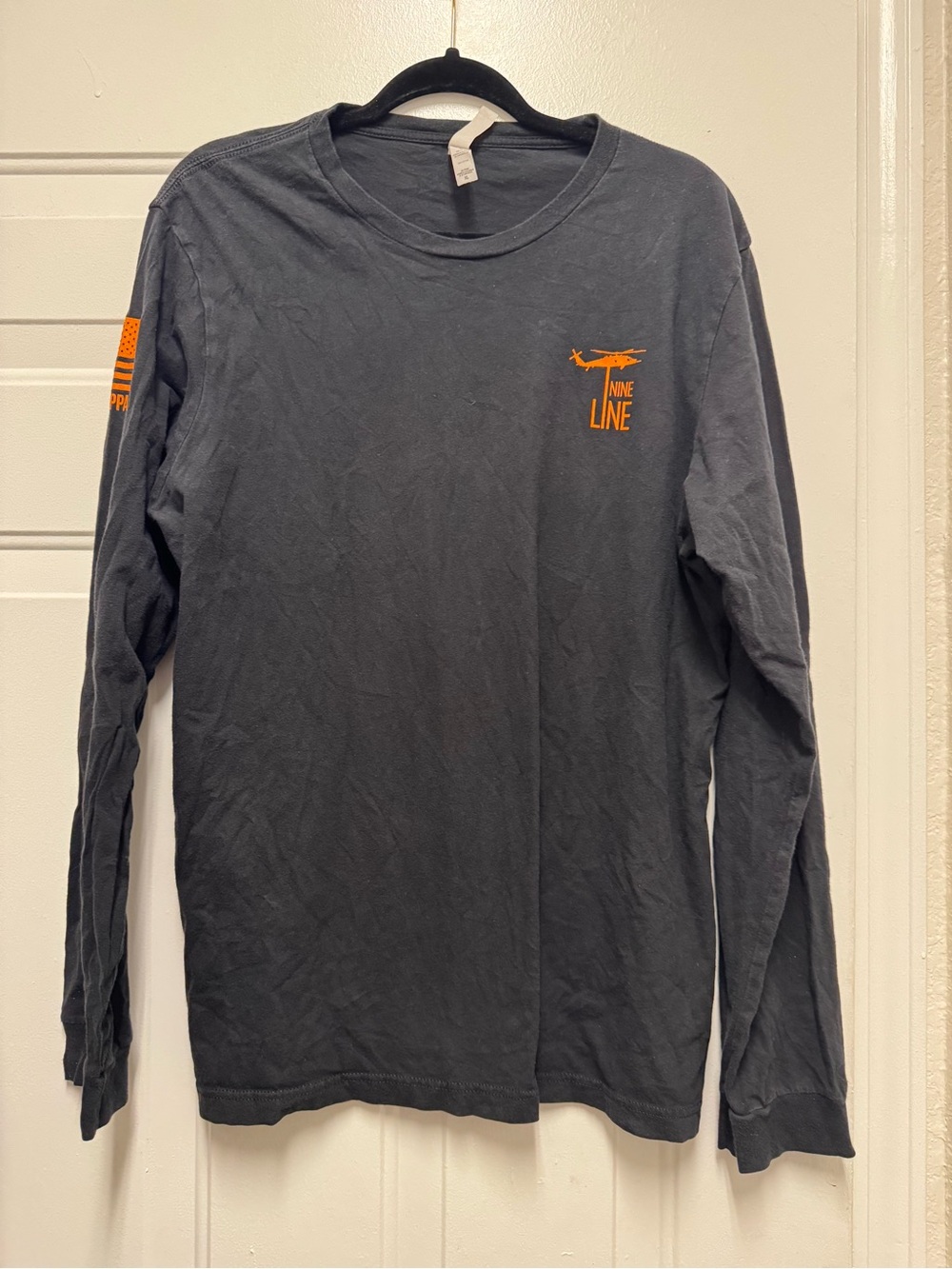 Bella Canvas Men's Long Sleeve Tee in Black with Orange Logo
